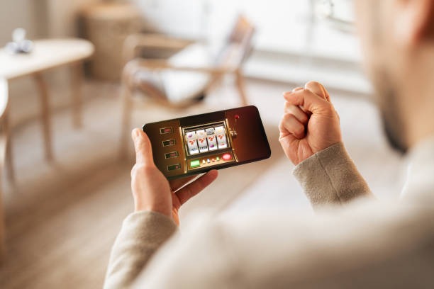 Live football streaming and casino games displayed on mobile screen